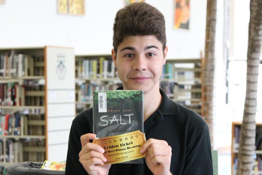 A lucky student finds a golden ticket in his book.