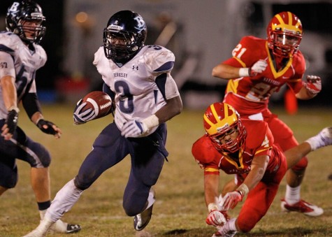 Wide Receiver Nelson Agholor, '13, out-jumps cornerback to get the catch.