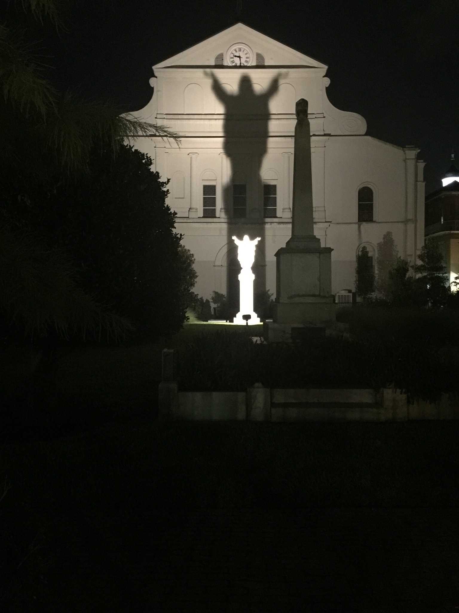 HAUNTED MYSTERIES: New Orleans' mysteries remain unanswered, but you can look for clues on one of the many haunted tours of the city. This particular statue is called Touchdown Jesus, because it looks like a referee calling a touchdown.