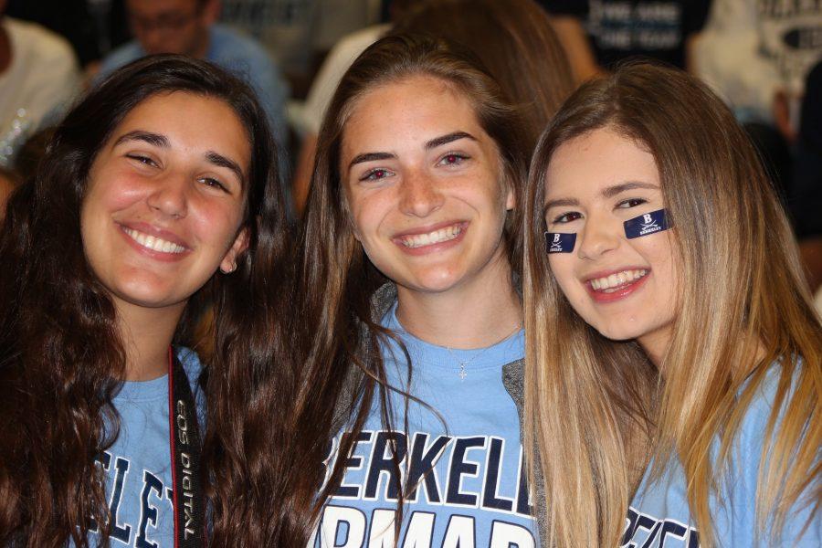 HOMECOMING T-SHIRTS ARE A HIT WITH THE ARMADA: (from left) Melissa Miller ’19, Gigi Novello ‘19 and Danielle Carolan ’17 sport this years Homecoming T-shirt. The Carolina Blue hue dominated Friday’s Pep Rally as members of the Armada cheered for the right to the Spirit Stick. 