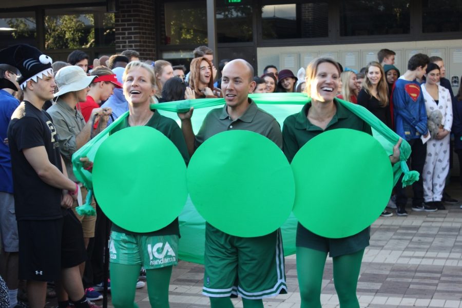 BE HEALTHY: The Lower Division PE Faculty (from left) Jenn Shannon-Martin, Sean Davidson and Tara Martz promote healthy eating by dressing up as three peas in a pod.