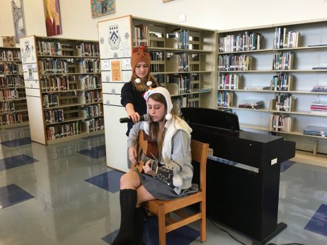 THAT WAS AN ORIGINAL?! Emcee Katie Crino ’18, moves the audience with an amazing original song with some mic help by her fellow emcee Addison Aloian ’18.