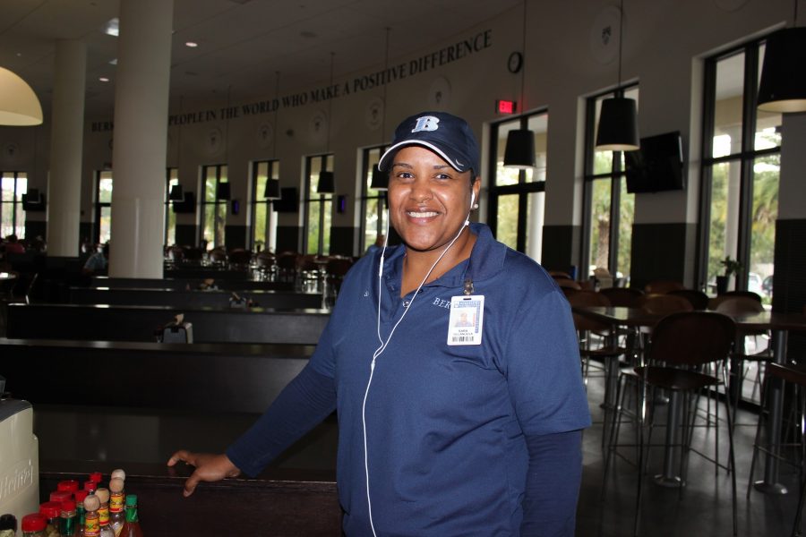 MUSIC GETS US THROUGH THE DAY: Sara Villanueva listens to music while working. “I mostly listen to R&B,” she says before moving on, stopping to smile at students and teachers as they pass in for a morning meal. 
