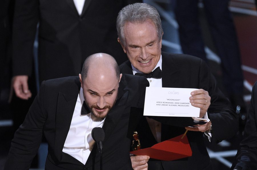SOMETHING IN THE MOONLIGHT: Jordan Horowitz, producer of La La Land, shows the envelope reporting that Moonlight was the real winner of best picture after “La La Land” was accidentally pronounced the winner for the Academy Award for Best Picture at the 89th Academy Awards.