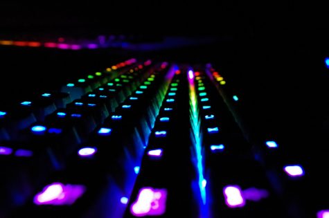 A FULL SPECTRUM OF OPINIONS: Within this column, I aim to provide a variety of opinions regarding different genres of video games and a multitude of publishers, symbolized by the wide spectrum of colors displayed across this Razer BlackWidow Chroma keyboard.