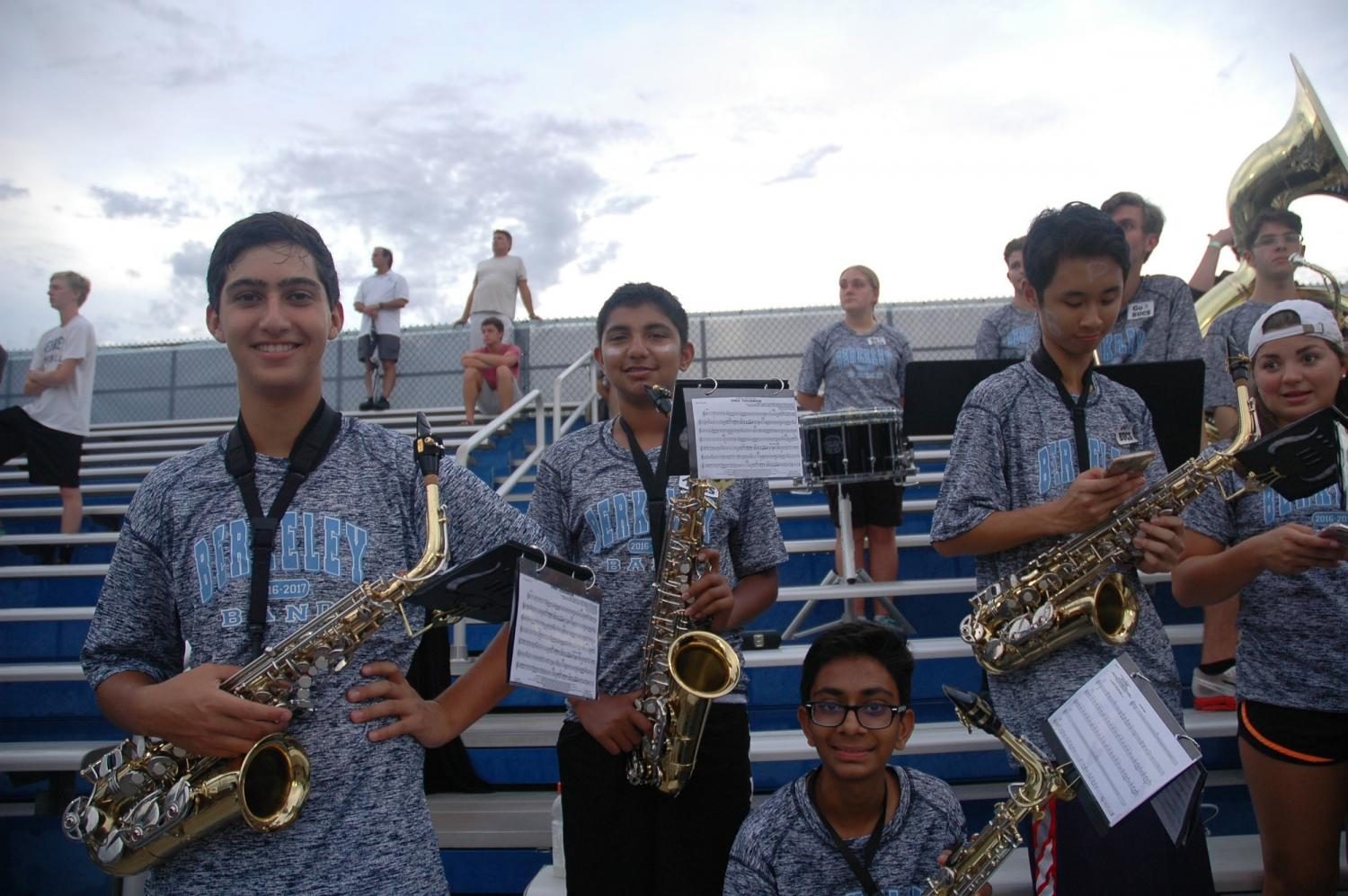 BANDING TOGETHER: Berkeley Band members Samir Saeed ’21, Ryan D’Cunha ’21 and Kevin Patel ’21 were proud to play during their first Tailgate as high school students.