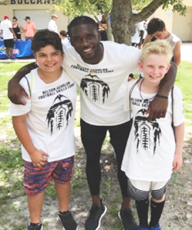 SMILE FOR THE CAMERA: Agholor took some time to pose for pictures with some of the campers after the camp ended.
