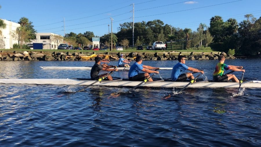 TRAINING FOR THE HOOCH: Dev Kapadia '19, Richard Shao '19, James Koh '20, and Bill van de Groep '20 (left to right) trained for the Head of the Hooch Rowing Competition.