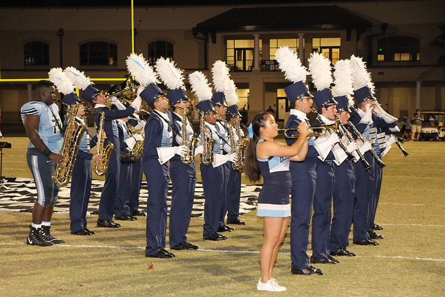 ENDING ON A HIGH NOTE: The marching band excites the crowd at the Homecoming football game.