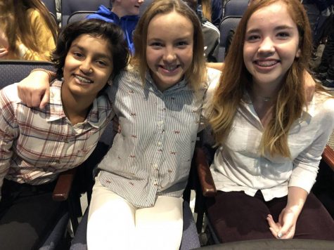 COLLARED SHIRTS AND COLORED PANTS: Skylar Baria ’22, Lily Paggio ’22 and Sutton Johnson ’22, happy to be out of uniform, smile before Upper Division convo.