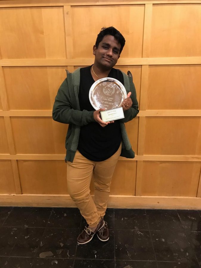 WAKE FOREST WIN: Menon holds his individual speaker second place trophy in the Quarter Finals at Wake Forest University, where Menon will attend school in the fall. Additionally, he qualified for the Tournament of Champions for his second year.