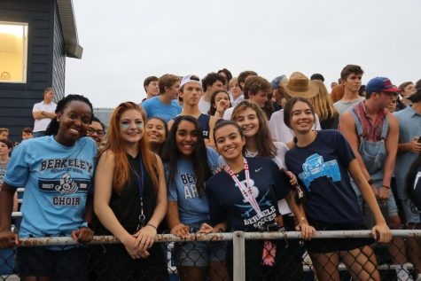 AMAZING ARMADA: (From left to right) Kennedy Perry ’20, Anna Ames ’19, Sneha Patel ’19, Ornella Pigeon ’19, Annabelle Derrick ’19, and Nadine Elkasri ’19 show their spirit, wearing blue and smiles in the stands.