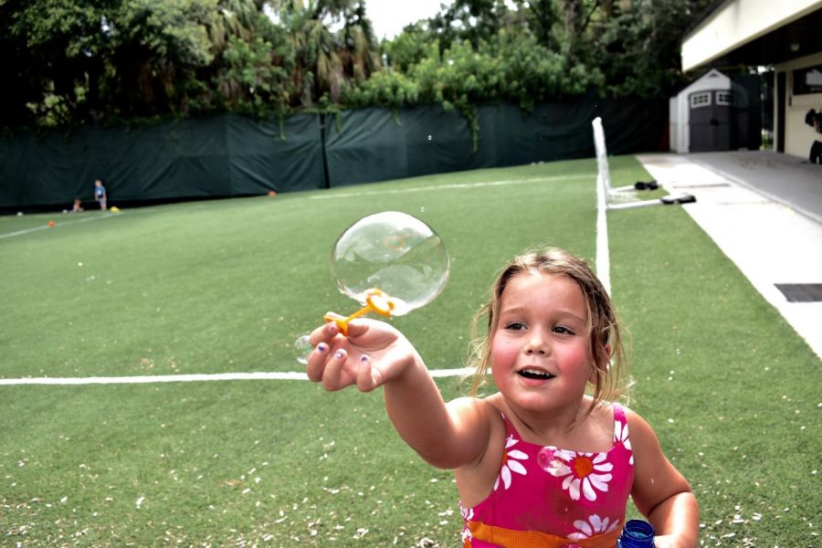 BLOWING BUBBLES: Scout balances her biggest bubble yet before lunch time. 