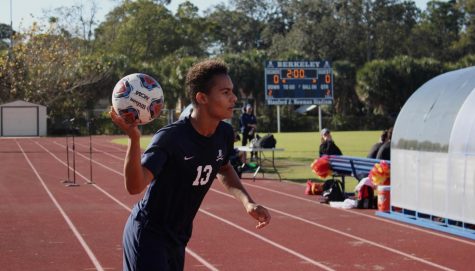 WE GOT THE BALL: Peter Tanner ’19 retrieves a ball that rolled off of Newman Field during the JV boys soccer game.