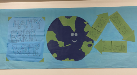 FUN WITH EARTH: The Environmental Club comes together after school to create a wonderful and cute banner for Earth Week. (Image from Rachel Mintz ‘21)