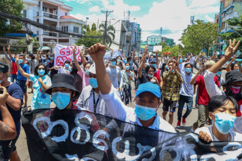 MYANMAR MADNESS Anti-coup protesters march during a demonstration in Yangon, Myanmar on Wednesday May 12, 2021. One hundred days after their takeover, Myanmar's ruling generals maintain just the pretense of control. The illusion is sustained mainly by its partially successful efforts to shut down independent media and to keep the streets clear of large demonstrations by employing lethal force. (AP Photo)