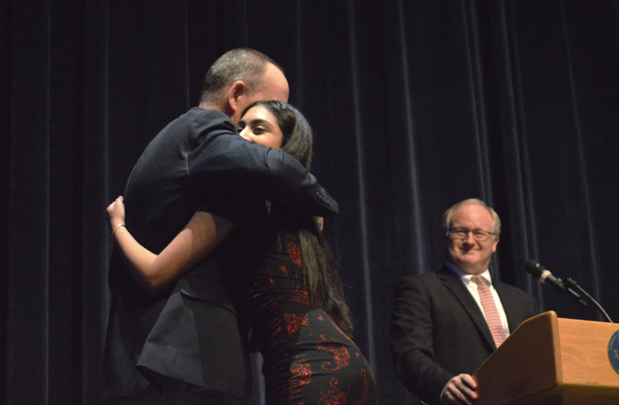 MATH AND GOODBYES: After winning her award in mathematics, Aleena Farooq 22 and Mr. Ide embrace. (Photo Credit: Samantha Zophin)