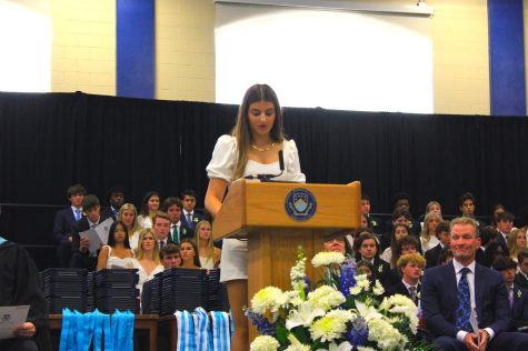 WELCOMING THE SENIORS: Student Forum president Penelope Graspas ’22 delivers her welcome speech to begin the Commencement ceremony. (Photo Credit: Vivian Willis)