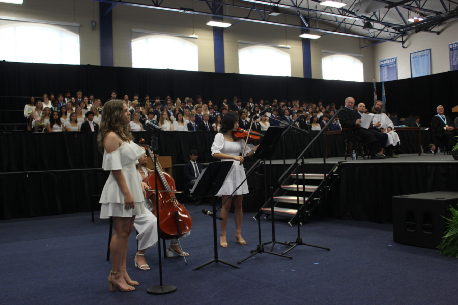 MUSICAL PERFORMANCE: Annie Sardouk ’23, Isabella Turipe-Blanchard ’23 and Zoey Chang ’23 perform “Go the Distance” by Alan Menken at Commencement. (Photo Credit: Conor Reid ’24)