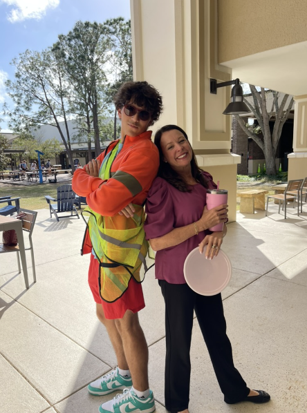 Kostas Saravanos ‘26 and Mrs. Beth Mariani pose at the Aye Arboretum on Halloween 