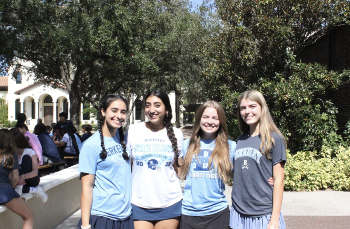 BLUE CREW: Kiran Dhaliwal ’26, Laya Kumar ’26, Alexandra Barsema ’26, and Alexa Miller ’26 smile together. 
